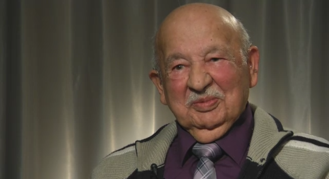 Screenshot from a video interview with Holocaust survivor Hans Seeger. Only Hans Seeger's head can be seen in a close-up.